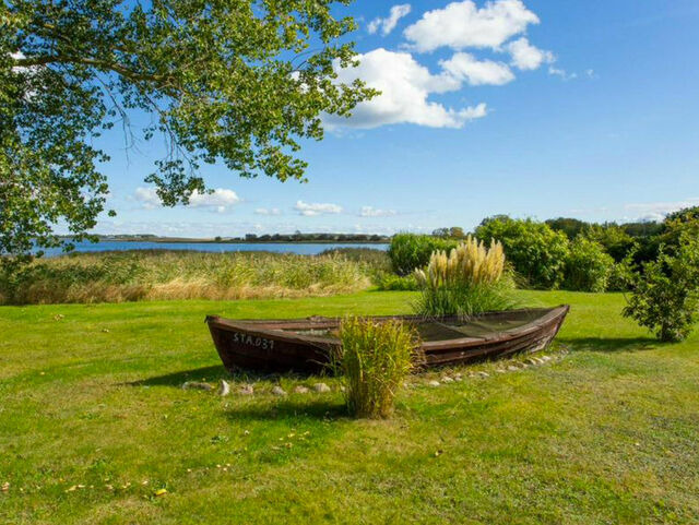 Ferienhaus in Garz - Familienferienhaus R&uuml;genbrise - Gemeinsames Urlauben mit Steg und Boot auf R&uuml;gen - alles inklusive und 5 B&auml;der - Bild 6